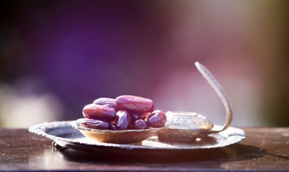 Festive greeting card for Muslim holy month Ramadan Kareem with dates, Quaran and censer