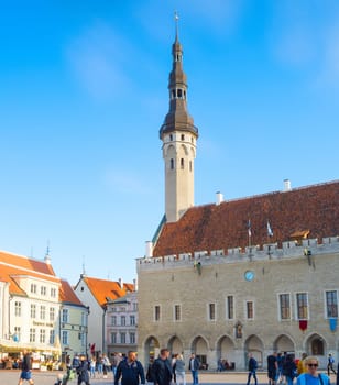 TALLINN, ESTONIA - JULY 14, 2019: People takign photo in front Tallin Hall at Old Town of Tallin