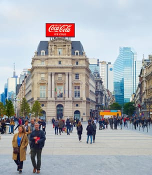 BRUSSELS, BELGIUM - OCTOBER 05, 2019: People walking by central street of Brussels, Belgium.