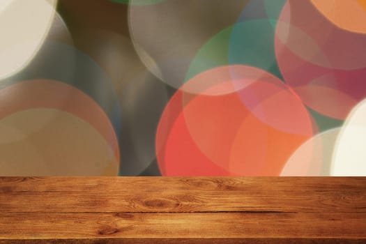 The background is an empty wooden board and a wall of blurred bokeh lights. For product demonstrations, free space, layout, mockup, perspective board, background board.