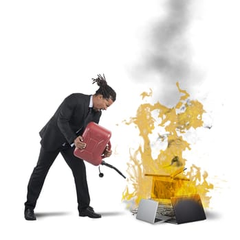 A businessman stressed and pissed burns computers
