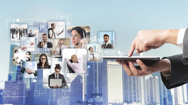Businessman checking his business team while working