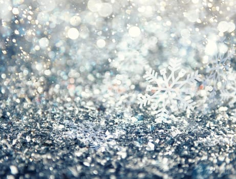 Abstract glowing Christmas blue background with snowflakes with light effect