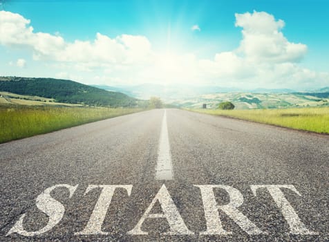 Road that says start in the asphalt. Concept of company startup