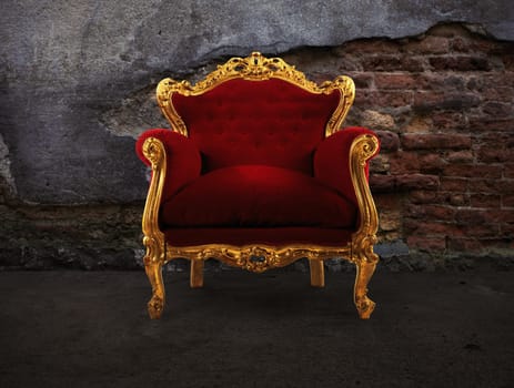 Concept of luxury and success with red velvet and gold armchair into an old room