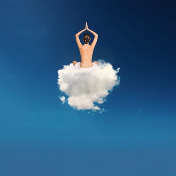 Young girl practices yoga over a soft cloud