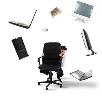 Businessman behind the chair has fear of computers and technology