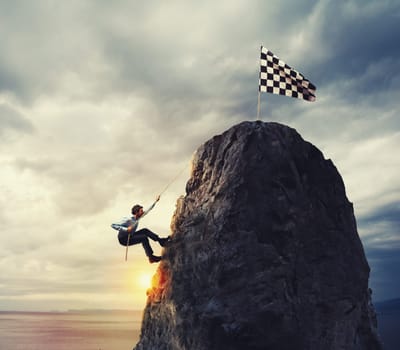 Businessman climb a mountain to get the flag. Achievement business goal and Difficult career concept