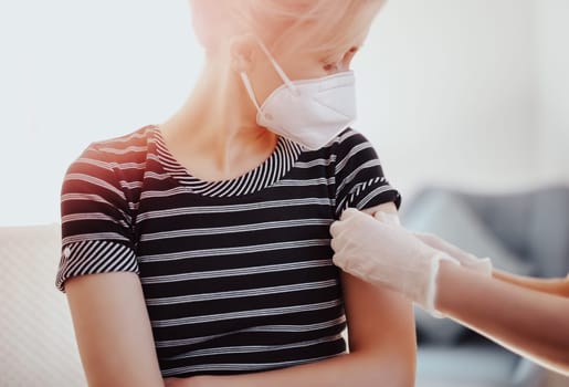 Woman and a doctor in the hospital after vaccination against Covid 19. Concept immunization and making injections from pandemic of SARS.
