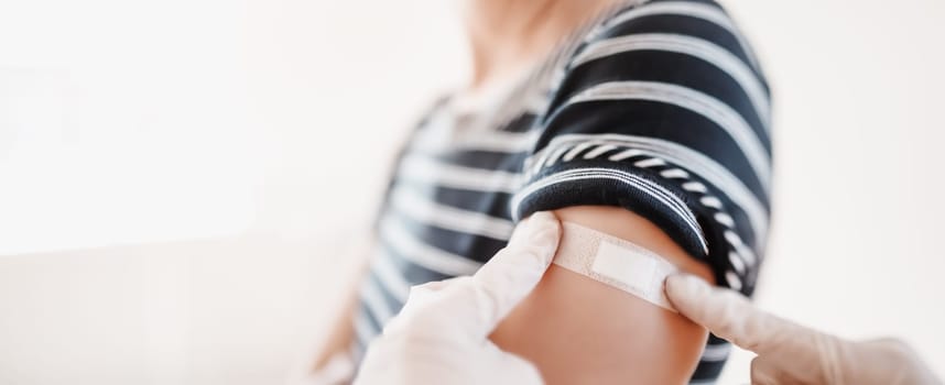Woman and a doctor in the hospital after vaccination against Covid 19. Concept immunization and making injections from pandemic of SARS.