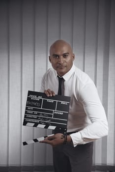 Concept of business in action with cinema ciack