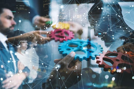 Teamwork of businesspeople work together and combine pieces of gears. Partnership and integration concept. double exposure
