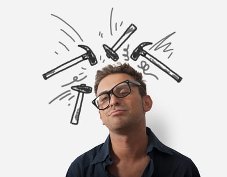 Concept of stressed businessman with hammer
