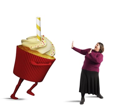 Fat woman is frightened by giant cupcake
