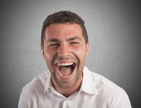 Desperate businessman stressed out from work screams
