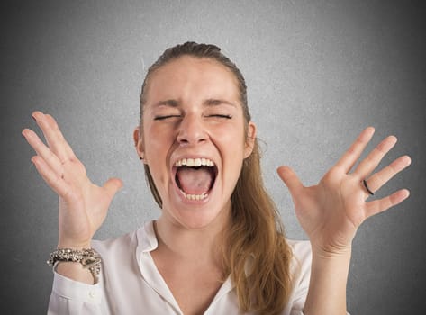 Desperate businesswoman stressed out from work screams