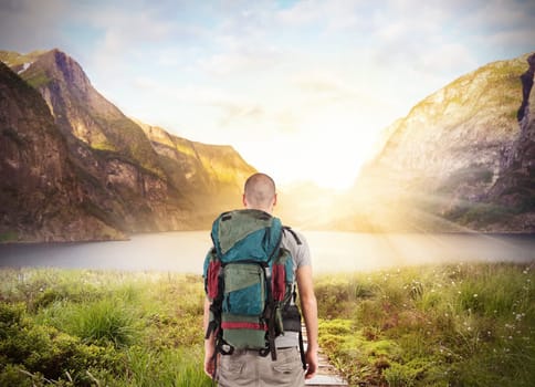Explorer find a lake in beautiful landscape