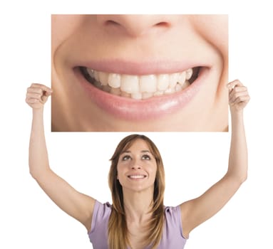 Girl shows her smile in a billboard