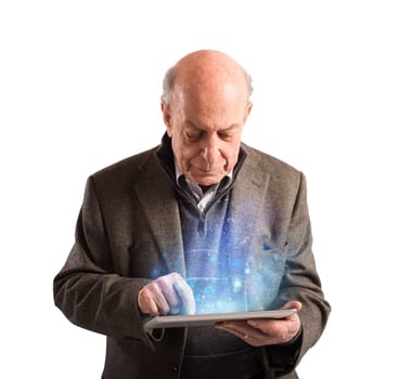 Senior uses tablet to surf the internet
