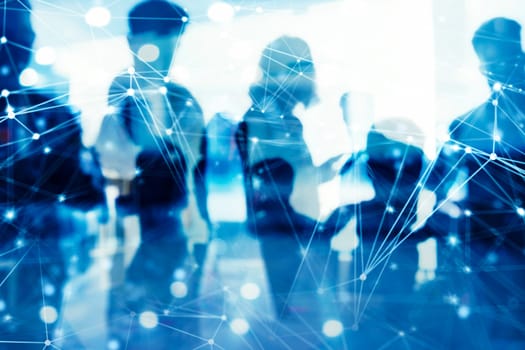 Business people work together in office with skyscraper on background with internet network effects. Concept of teamwork and partnership. double exposure