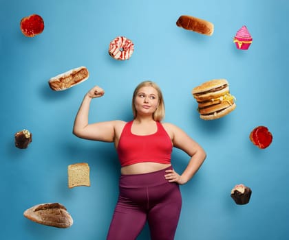 Fat girl does gym at home. thoughtful expression.