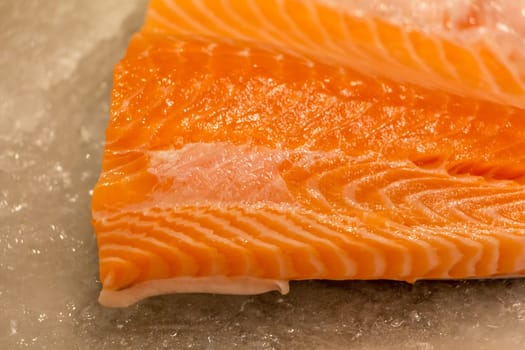 Traditional healthy sea food from seafood market with orange white stripes pattern. Quality food for sushi lunch or barbecue dinner.