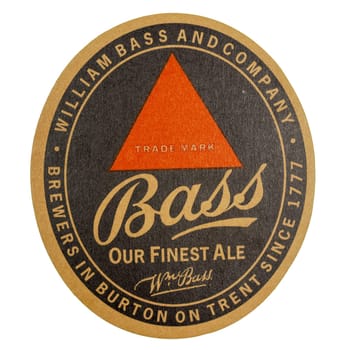 LONDON, UK - MARCH 15, 2015: Beermat of British beer Bass isolated over white background