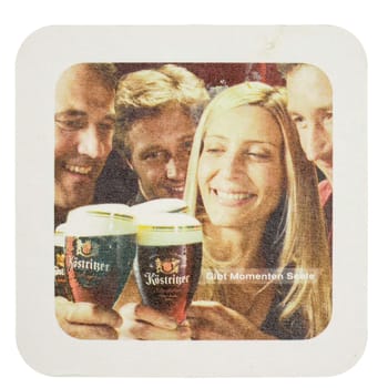 BERLIN, GERMANY - MARCH 15, 2015: Beermat of German beer Koestriker isolated over white background
