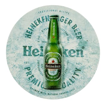 AMSTERDAM, NETHERLANDS - MARCH 15, 2015: Beermat of Dutch beer Heineken isolated over white background