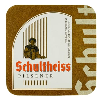 BERLIN, GERMANY - MARCH 15, 2015: Beermat of German beer Schultheiss isolated over white background