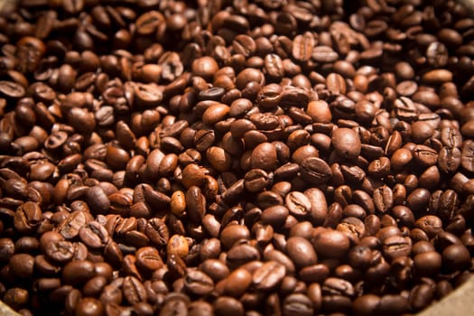 Background of delicious freshly roasted coffee beans