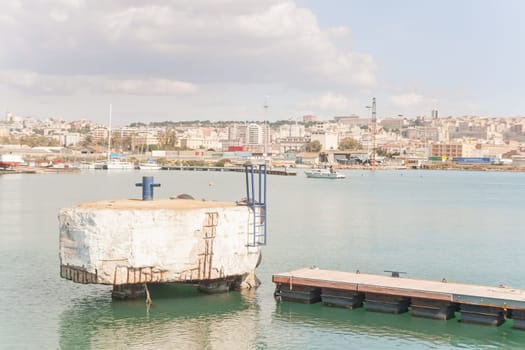 Landing at the pier in Cagliari harbor .