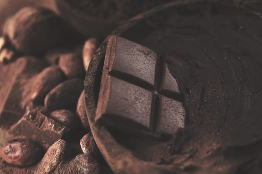 Milk and dark chocolate on a natural paper background