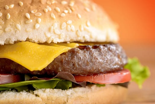 an American burguer with chips and coke