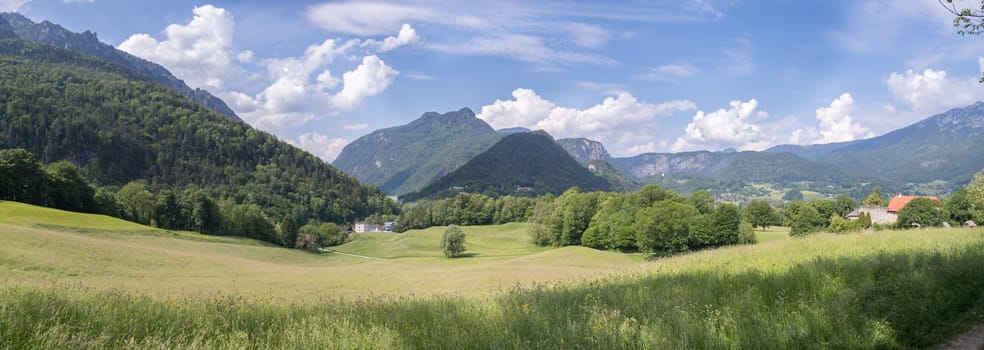 Panorama of mountains, sky and meadow in Bavaria near Bad Reichenhall, Germany