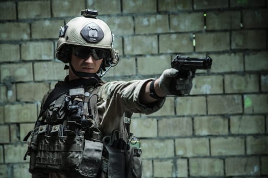 US Army Ranger aiming pistol with one hand