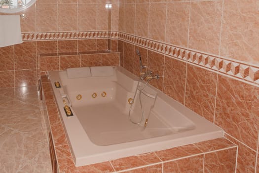 Beautiful bathroom with whirlpool bathtub and separate shower.