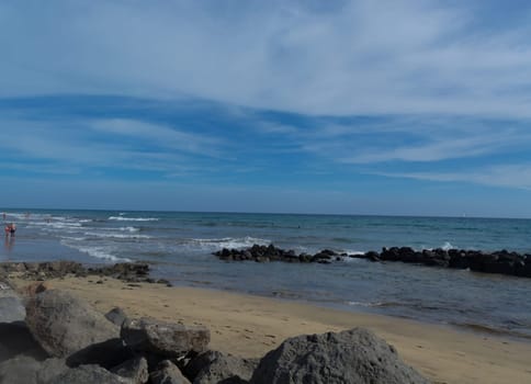 Beach of Gran Canaria in Meloneras, beach near lighthouse.