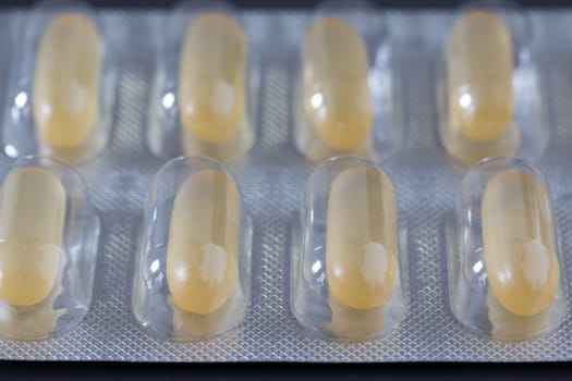 Pills / medicine lying on the grey table, flu season