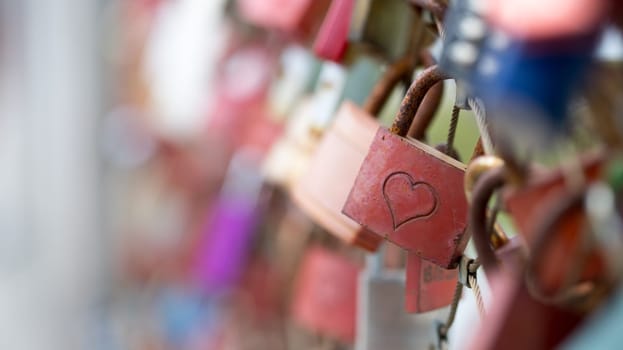 Colourful cute love locks on Markartsteg, Salzburg  Copy space and blurryness