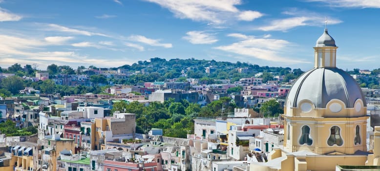 PROCIDA, ITALY - CIRCA AUGUST 2020: panoramic view of the mediterranean Italian island close to Naples in a summer day.