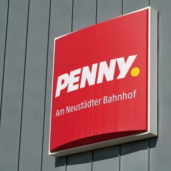 Neon sign for a branch of the food discounter Penny in the city center of Magdeburg in Germany