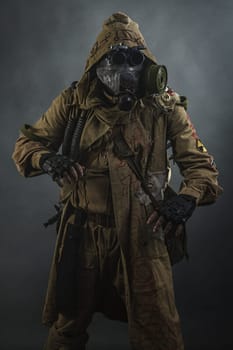 Nuclear post apocalypse. Studio shot of survivor in tatters