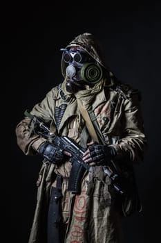 Nuclear post apocalypse. Studio shot of survivor in tatters