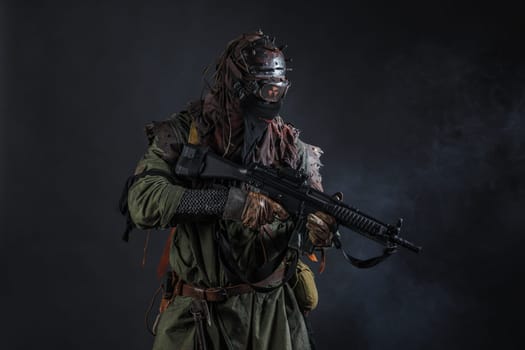 Nuclear post apocalypse. Studio shot of survivor in tatters