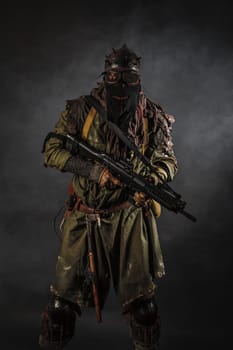 Nuclear post apocalypse. Studio shot of survivor in tatters