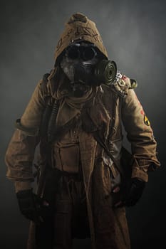 Nuclear post apocalypse. Studio shot of survivor in tatters
