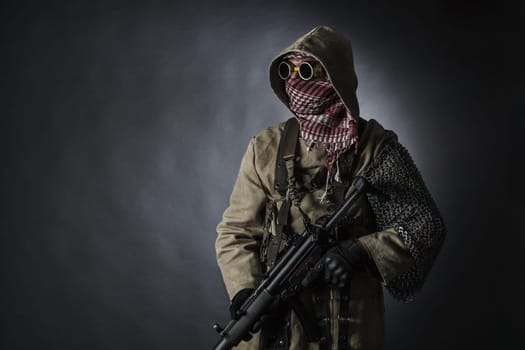 Nuclear post apocalypse. Studio shot of survivor in tatters
