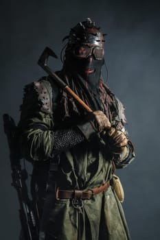 Nuclear post apocalypse. Studio shot of survivor in tatters