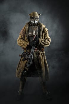 Nuclear post apocalypse. Studio shot of survivor in tatters